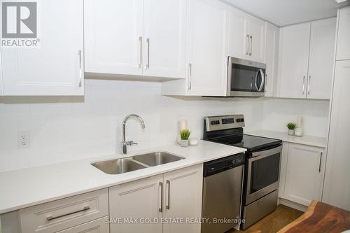 24 - 2199 Lillykin Street, Oakville (River Oaks), ON - Indoor Photo Showing Kitchen With Double Sink With Upgraded Kitchen