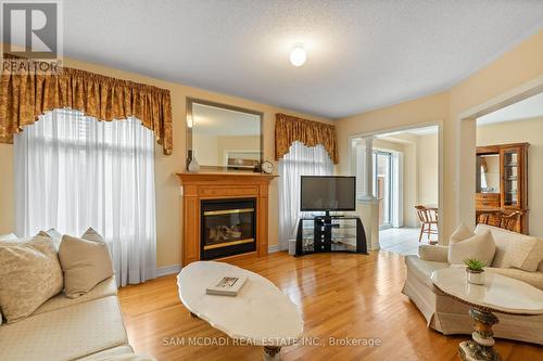 28 Millsborough Road, Brampton, ON - Indoor Photo Showing Living Room With Fireplace