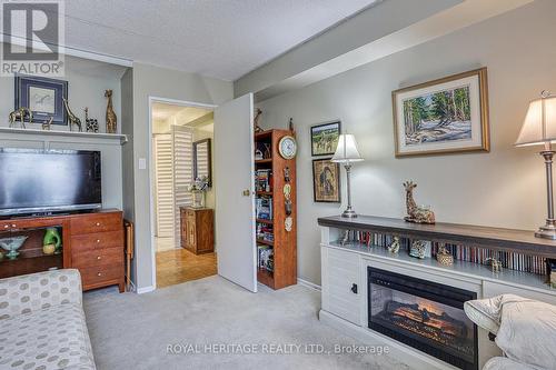 215 - 1525 Diefenbaker Court, Pickering (Town Centre), ON - Indoor With Fireplace