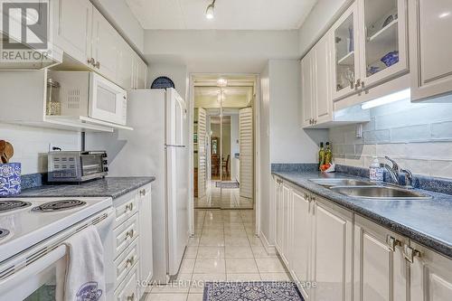 215 - 1525 Diefenbaker Court, Pickering (Town Centre), ON - Indoor Photo Showing Kitchen With Double Sink