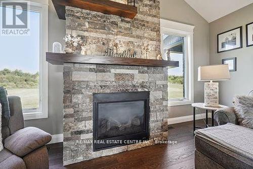 9738 Dundas Street E, Erin, ON - Indoor Photo Showing Living Room With Fireplace