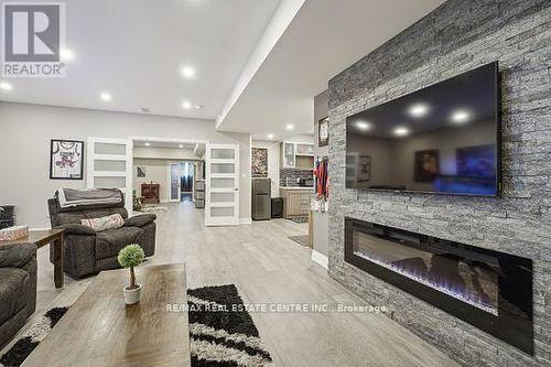 9738 Dundas Street E, Erin, ON - Indoor Photo Showing Living Room With Fireplace