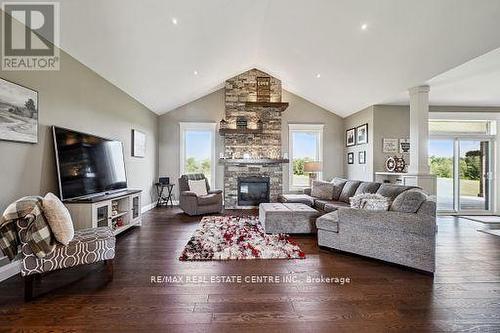 9738 Dundas Street E, Erin, ON - Indoor Photo Showing Living Room With Fireplace