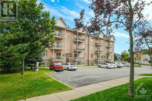 2 parking spots, 1 by back door - 190 Rustic Hills Crescent Unit#6, Ottawa, ON - Outdoor With Balcony With Facade