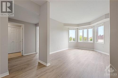 Large bay window, providing a panoramic view that's sure to captivate - 190 Rustic Hills Crescent Unit#6, Ottawa, ON - Indoor Photo Showing Other Room