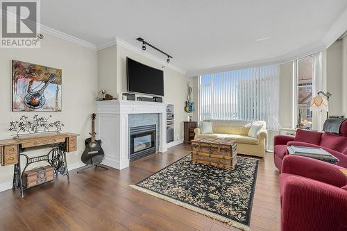 1152 Sunset Drive Unit# 1502, Kelowna, BC - Indoor Photo Showing Living Room With Fireplace