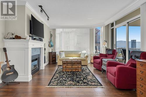 1152 Sunset Drive Unit# 1502, Kelowna, BC - Indoor Photo Showing Living Room With Fireplace