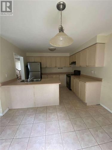 87 Norland Circle, Oshawa, ON - Indoor Photo Showing Kitchen With Double Sink