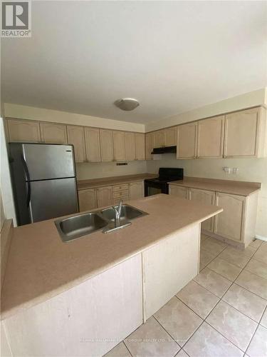 87 Norland Circle, Oshawa, ON - Indoor Photo Showing Kitchen With Double Sink