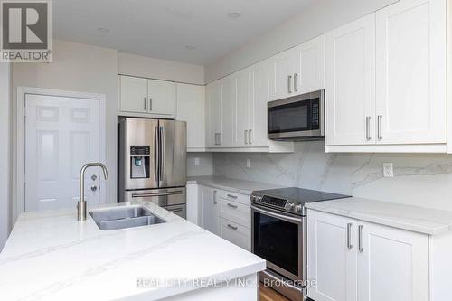 54 Killington Avenue, Vaughan, ON - Indoor Photo Showing Kitchen With Double Sink