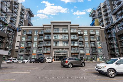 702 - 460 Dundas Street E, Hamilton (Waterdown), ON - Outdoor With Facade