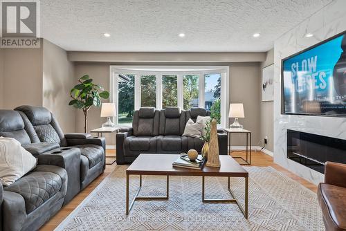 386 Hillcroft Street, Oshawa (O'Neill), ON - Indoor Photo Showing Living Room With Fireplace