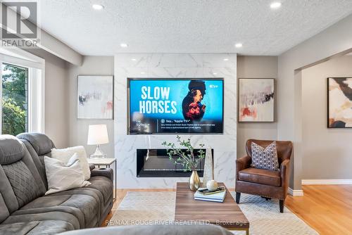 386 Hillcroft Street, Oshawa (O'Neill), ON - Indoor Photo Showing Living Room With Fireplace