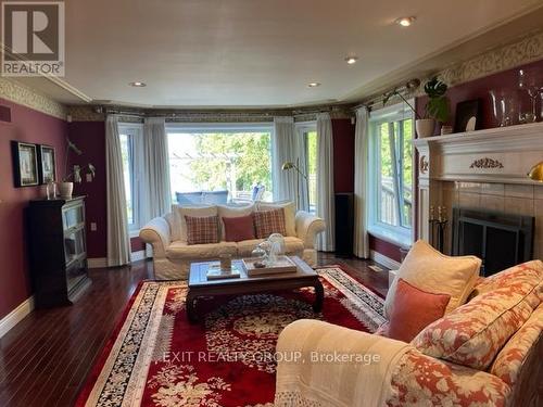 23 Quigg Lane, Prince Edward County (Ameliasburgh), ON - Indoor Photo Showing Living Room With Fireplace