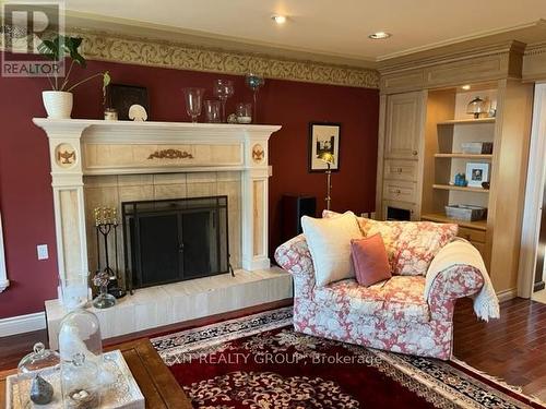 23 Quigg Lane, Prince Edward County (Ameliasburgh), ON - Indoor Photo Showing Living Room With Fireplace