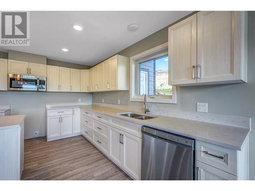 5620 51St Street Unit# 404, Osoyoos, BC - Indoor Photo Showing Kitchen With Double Sink