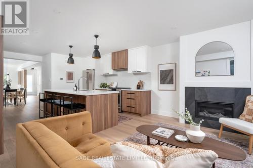 245 Linsmore Crescent, Toronto (Danforth Village-East York), ON - Indoor Photo Showing Living Room With Fireplace