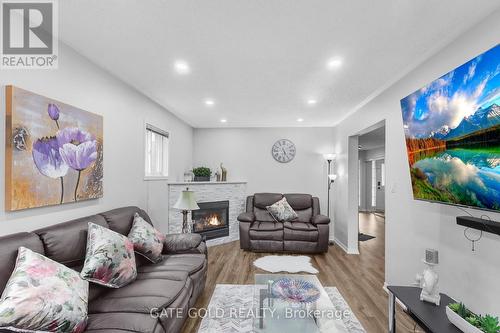 54 Marchwood Crescent, Clarington, ON - Indoor Photo Showing Living Room With Fireplace