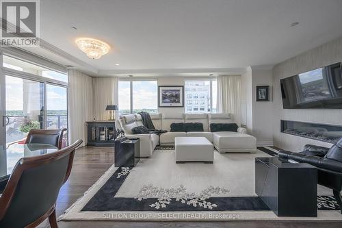 810 - 240 Villagewalk Boulevard, London, ON - Indoor Photo Showing Living Room With Fireplace