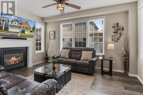 106 Port Of Newcastle Drive, Clarington (Newcastle), ON - Indoor Photo Showing Living Room With Fireplace