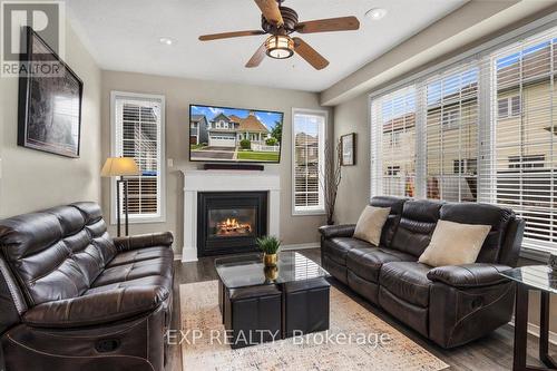 106 Port Of Newcastle Drive, Clarington (Newcastle), ON - Indoor Photo Showing Living Room With Fireplace