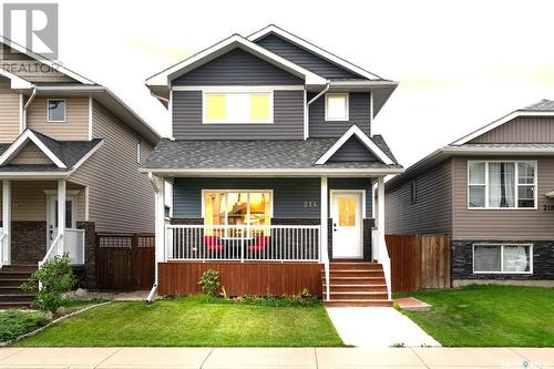 214 Wyant Lane, Saskatoon, SK - Outdoor With Deck Patio Veranda With Facade