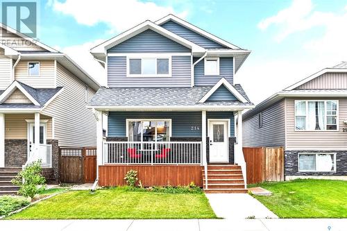 214 Wyant Lane, Saskatoon, SK - Outdoor With Deck Patio Veranda With Facade