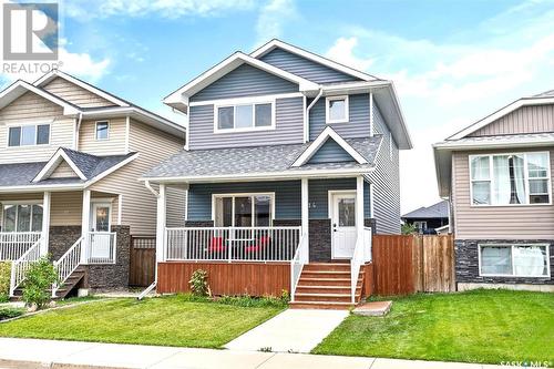 214 Wyant Lane, Saskatoon, SK - Outdoor With Deck Patio Veranda With Facade