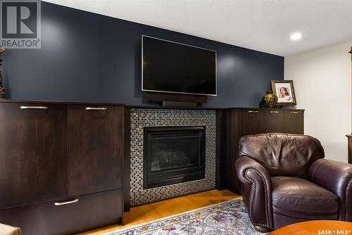 9244 Wascana Mews, Regina, SK - Indoor Photo Showing Other Room With Fireplace