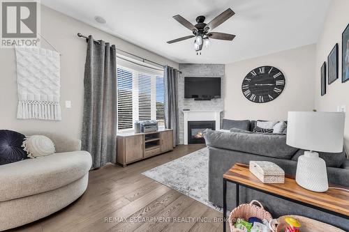 8 Saybrook Gardens, Hamilton (Stoney Creek), ON - Indoor Photo Showing Living Room With Fireplace