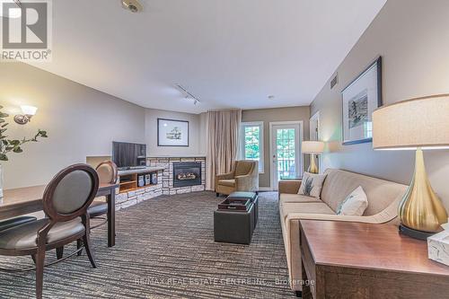 2240 - 90 Highland Drive, Oro-Medonte, ON - Indoor Photo Showing Living Room With Fireplace