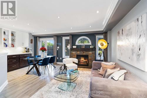 2097 Redstone Crescent, Oakville (West Oak Trails), ON - Indoor Photo Showing Living Room With Fireplace