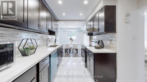 1 - 1000 Bridletowne Circle, Toronto (L'Amoreaux), ON - Indoor Photo Showing Kitchen With Upgraded Kitchen