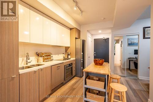 A428 - 5230 Dundas Street, Burlington, ON - Indoor Photo Showing Kitchen With Double Sink