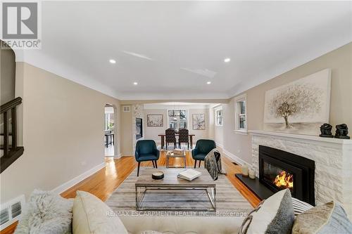 55 East 13Th Street, Hamilton, ON - Indoor Photo Showing Living Room With Fireplace