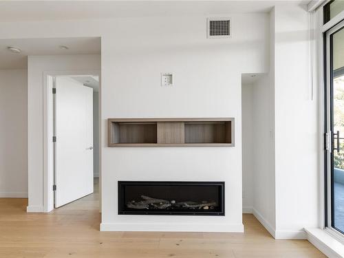 1012-2000 Hannington Rd, Langford, BC - Indoor Photo Showing Living Room With Fireplace