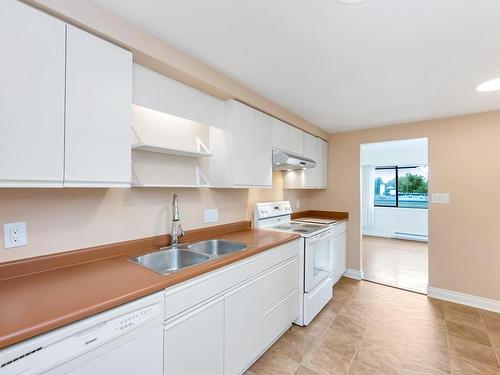 506-420 Linden Ave, Victoria, BC - Indoor Photo Showing Kitchen With Double Sink