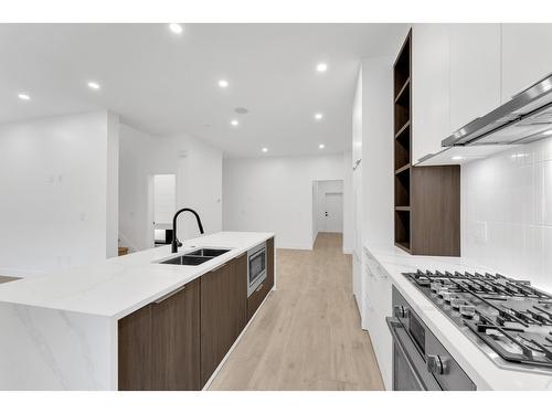 12 35706 Marshall Road, Abbotsford, BC - Indoor Photo Showing Kitchen With Double Sink With Upgraded Kitchen