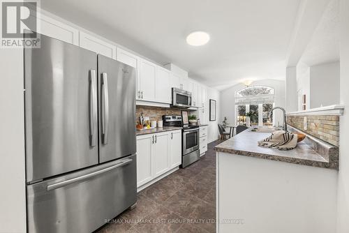 71 Westover Drive, Clarington (Bowmanville), ON - Indoor Photo Showing Kitchen With Double Sink