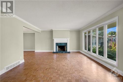 33 Riopelle Court, Ottawa, ON - Indoor Photo Showing Other Room With Fireplace