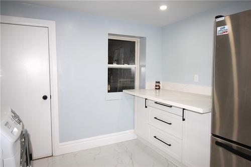 19 Emerald Street N, Hamilton, ON - Indoor Photo Showing Laundry Room