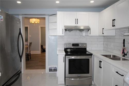 19 Emerald Street N, Hamilton, ON - Indoor Photo Showing Kitchen With Double Sink