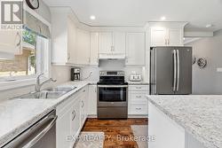 Beautiful white kitchen cupboards. - 