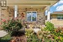 Covered porch fantastic spot for a morning coffee. - 295 Station Street, North Middlesex (Parkhill), ON  - Outdoor With Deck Patio Veranda 