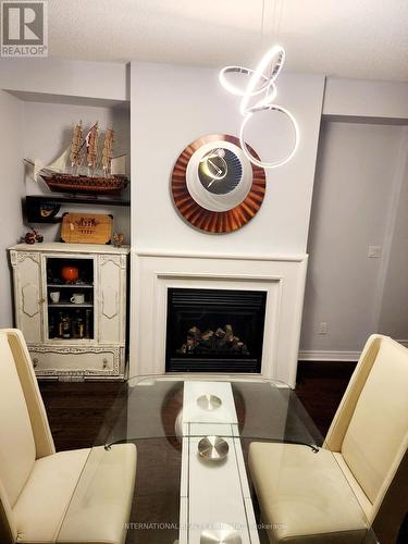 20 Fallis Crescent, Caledon, ON - Indoor Photo Showing Living Room With Fireplace