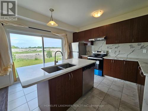 20 Sandhill Crane Drive, Wasaga Beach, ON - Indoor Photo Showing Kitchen With Double Sink