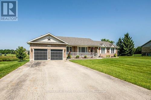 10 Simpson Street W, Mapleton (Alma), ON - Outdoor With Deck Patio Veranda With Facade