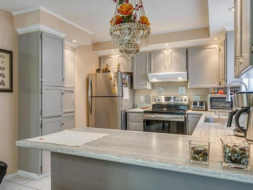 Kitchen - 201-13837 Rue Notre-Dame E., Montréal (Rivière-Des-Prairies/Pointe-Aux-Trembles), QC - Indoor Photo Showing Kitchen With Upgraded Kitchen