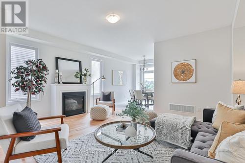 91 Bayardo Drive, Oshawa (Windfields), ON - Indoor Photo Showing Living Room With Fireplace