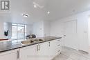 202 - 4600 Steeles Avenue E, Markham (Milliken Mills East), ON  - Indoor Photo Showing Kitchen With Double Sink 